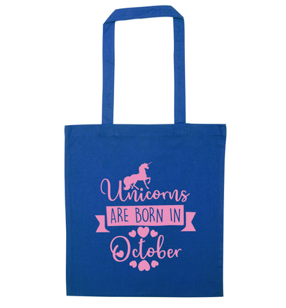 Unicorns are born in October blue tote bag