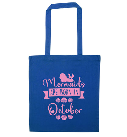 Mermaids are born in October blue tote bag