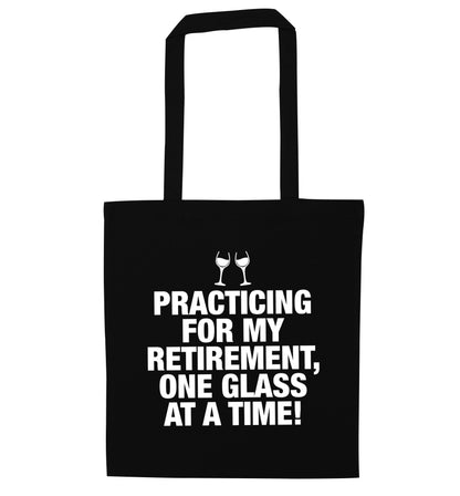 Practicing my retirement one glass at a time black tote bag