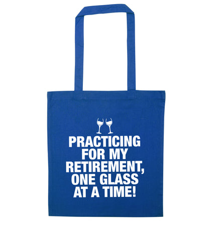 Practicing my retirement one glass at a time blue tote bag