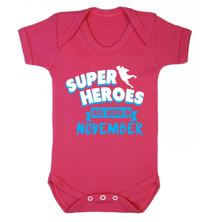 Superheroes are born in November Baby Vest dark pink 18-24 months