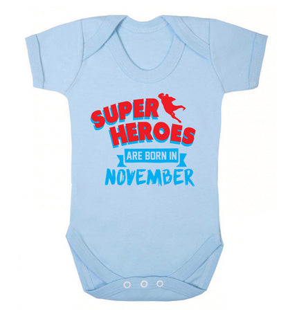 Superheroes are born in November Baby Vest pale blue 18-24 months