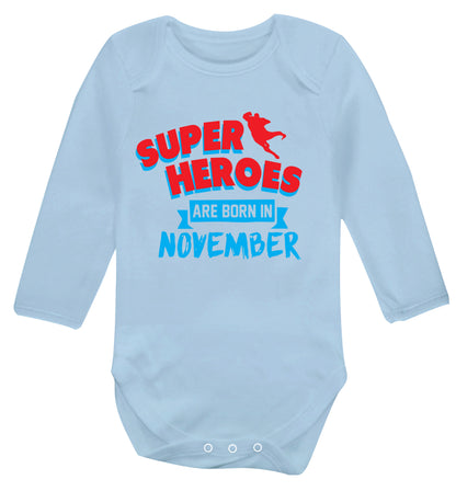 Superheroes are born in November Baby Vest long sleeved pale blue 6-12 months