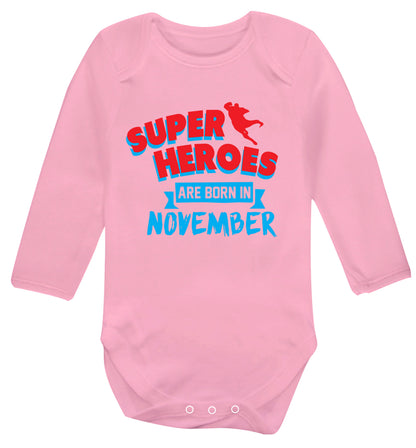 Superheroes are born in November Baby Vest long sleeved pale pink 6-12 months