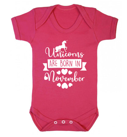Unicorns are born in November Baby Vest dark pink 18-24 months