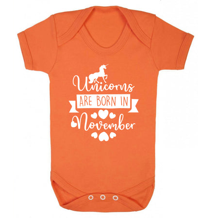 Unicorns are born in November Baby Vest orange 18-24 months