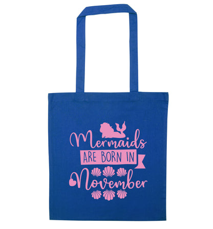 Mermaids are born in November blue tote bag