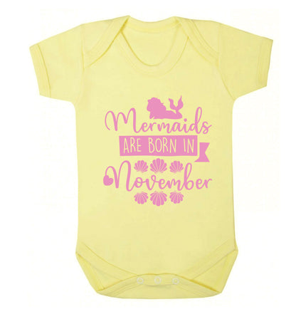 Mermaids are born in November Baby Vest pale yellow 18-24 months