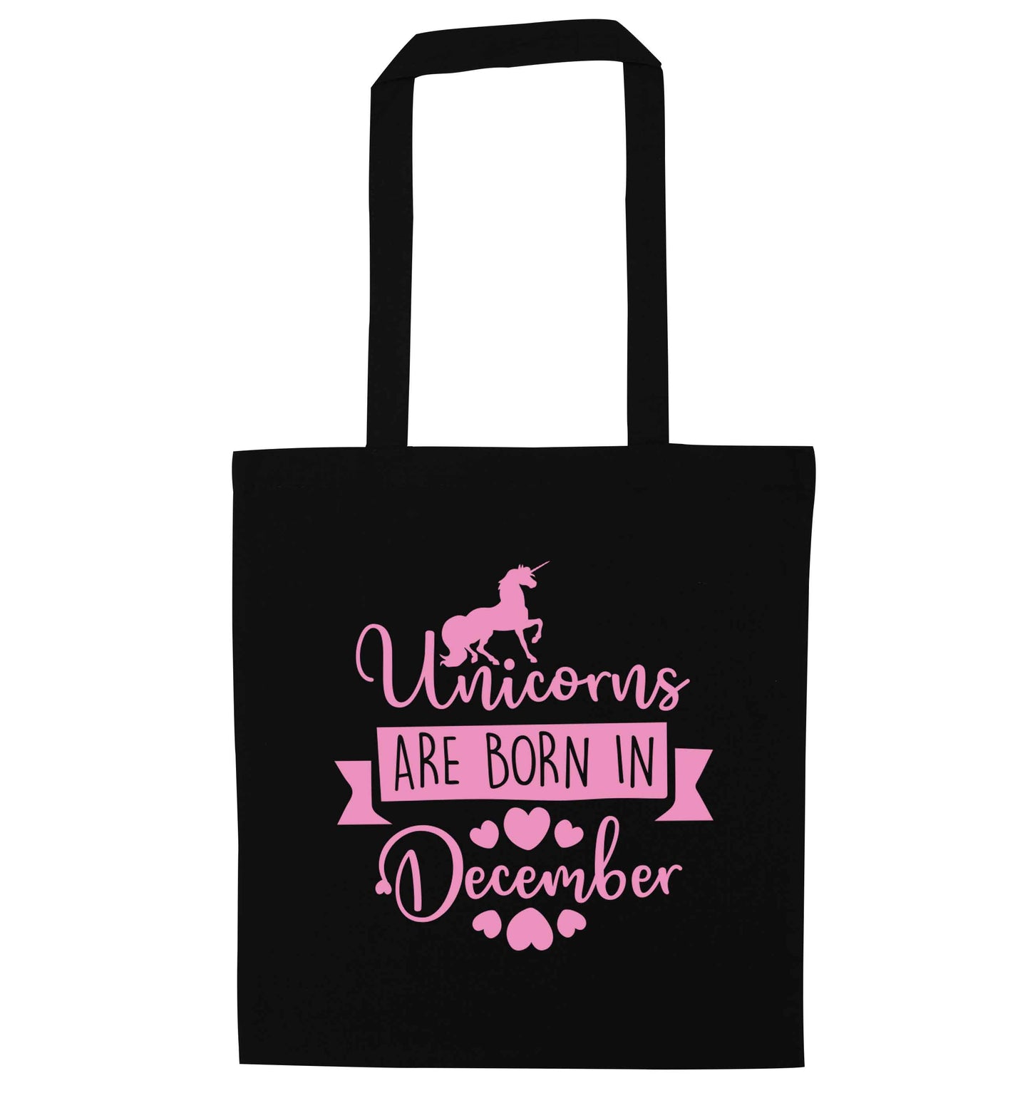 Unicorns are born in December black tote bag