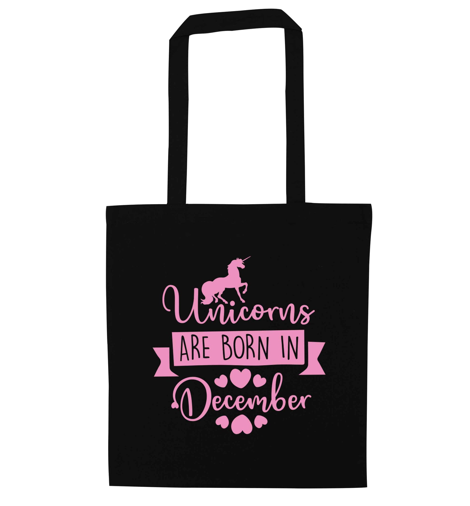 Unicorns are born in December black tote bag