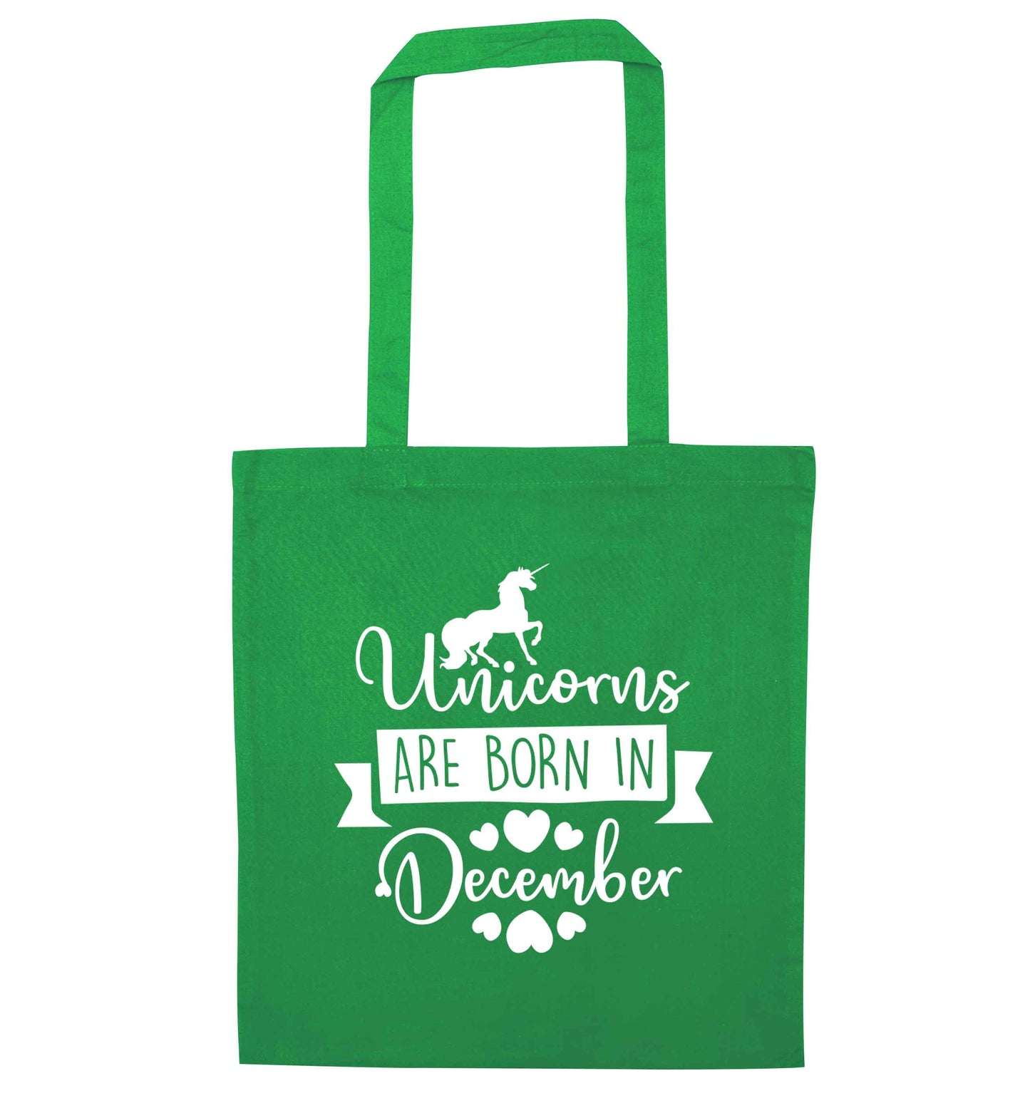 Unicorns are born in December green tote bag