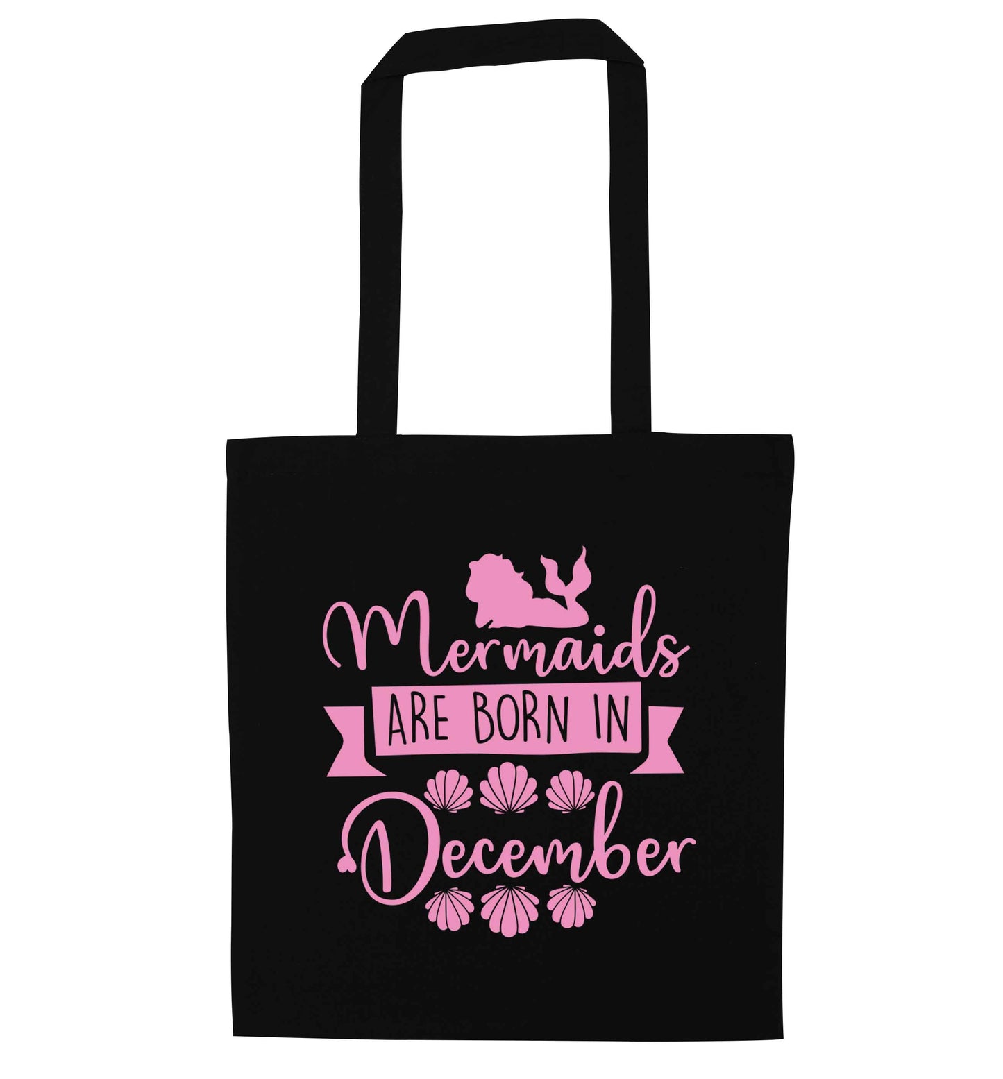 Mermaids are born in December black tote bag