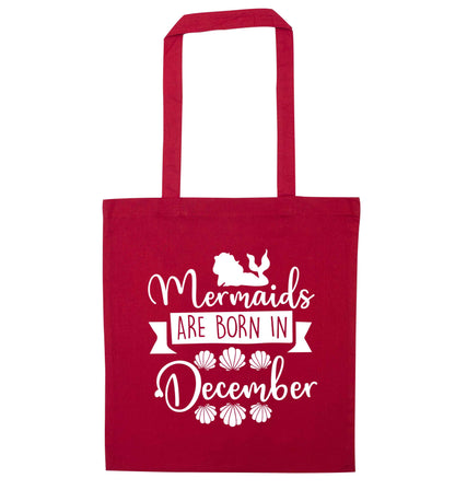 Mermaids are born in December red tote bag