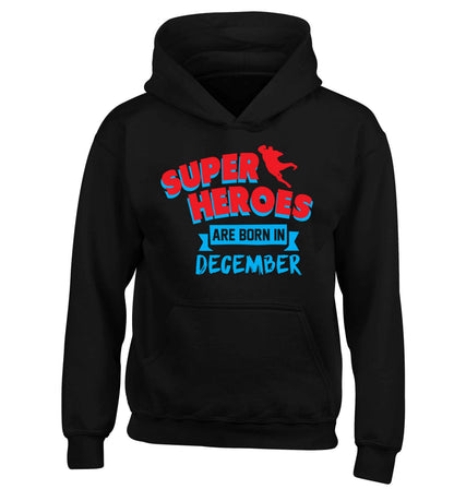 Superheroes are born in December children's black hoodie 12-13 Years