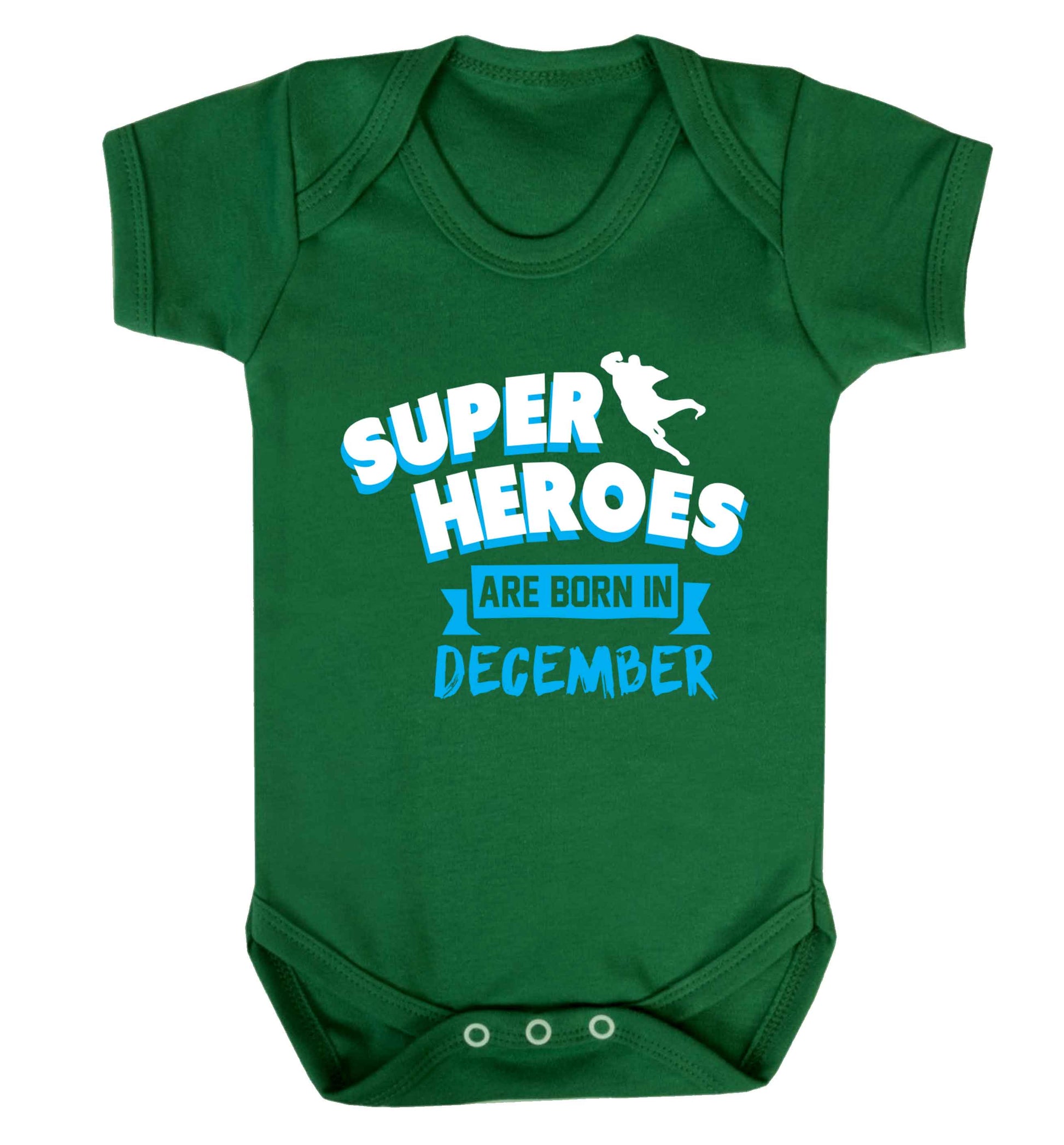 Superheroes are born in December Baby Vest green 18-24 months
