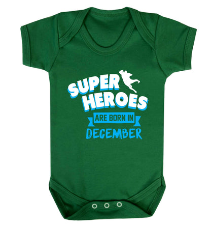 Superheroes are born in December Baby Vest green 18-24 months