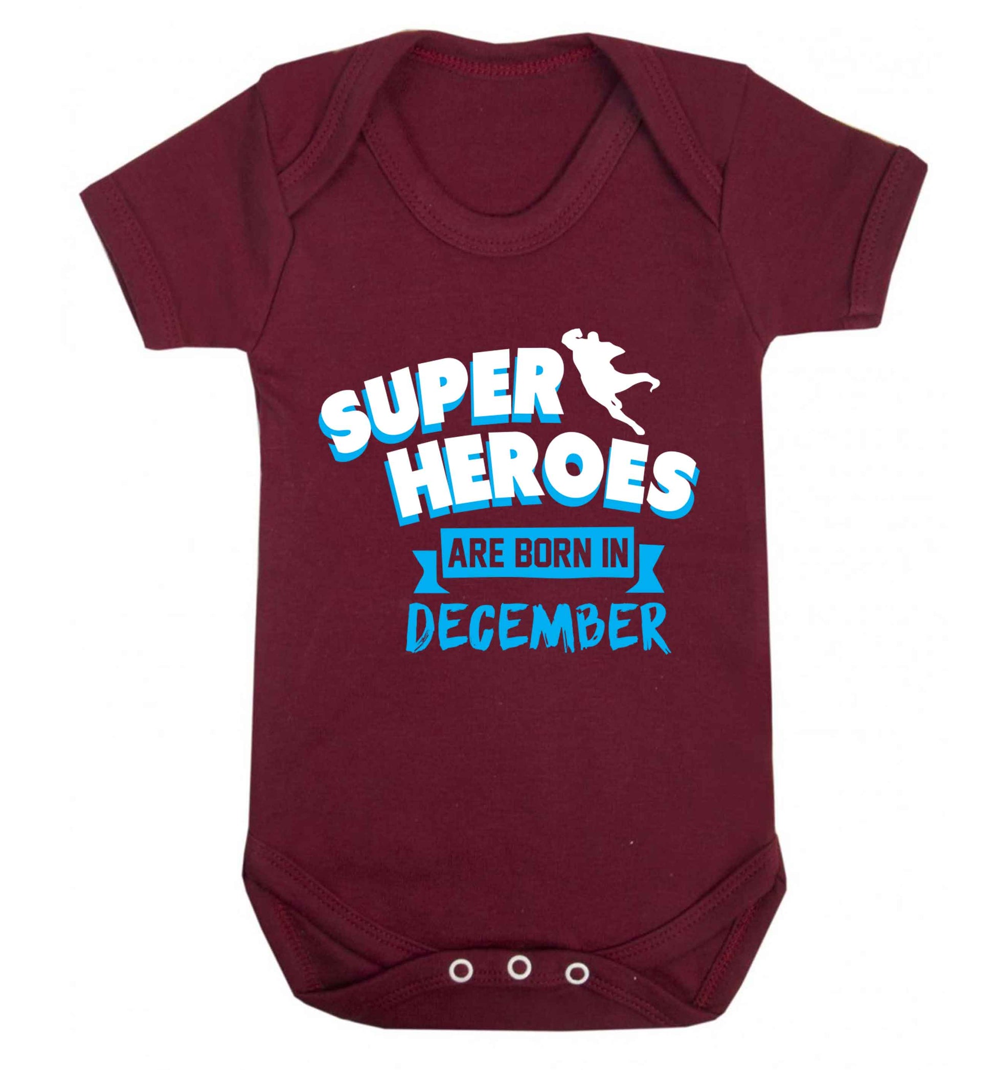 Superheroes are born in December Baby Vest maroon 18-24 months