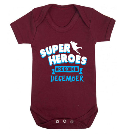 Superheroes are born in December Baby Vest maroon 18-24 months