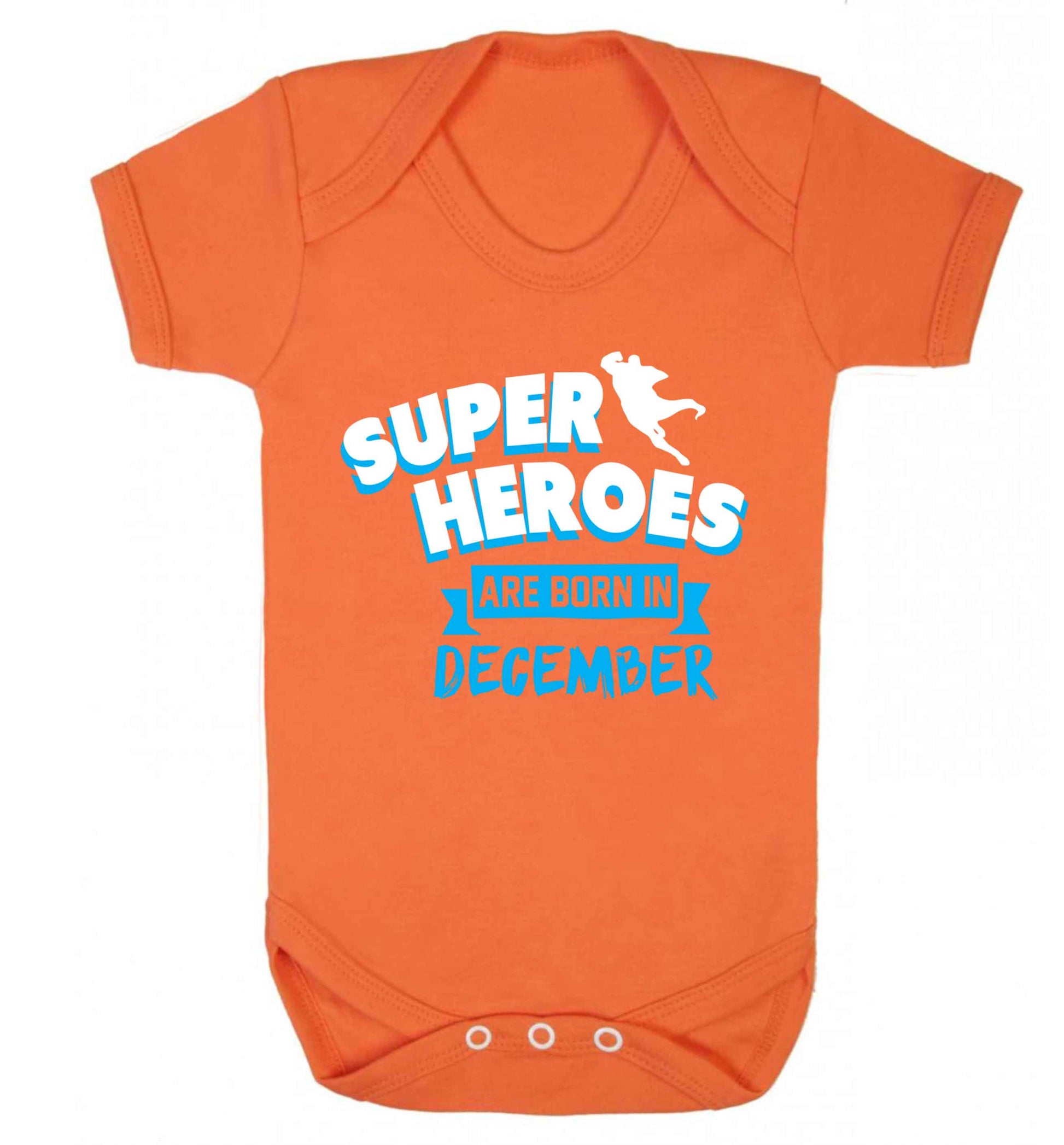 Superheroes are born in December Baby Vest orange 18-24 months
