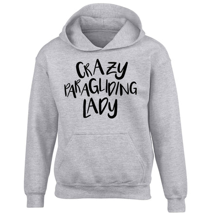 Crazy paragliding lady children's grey hoodie 12-13 Years