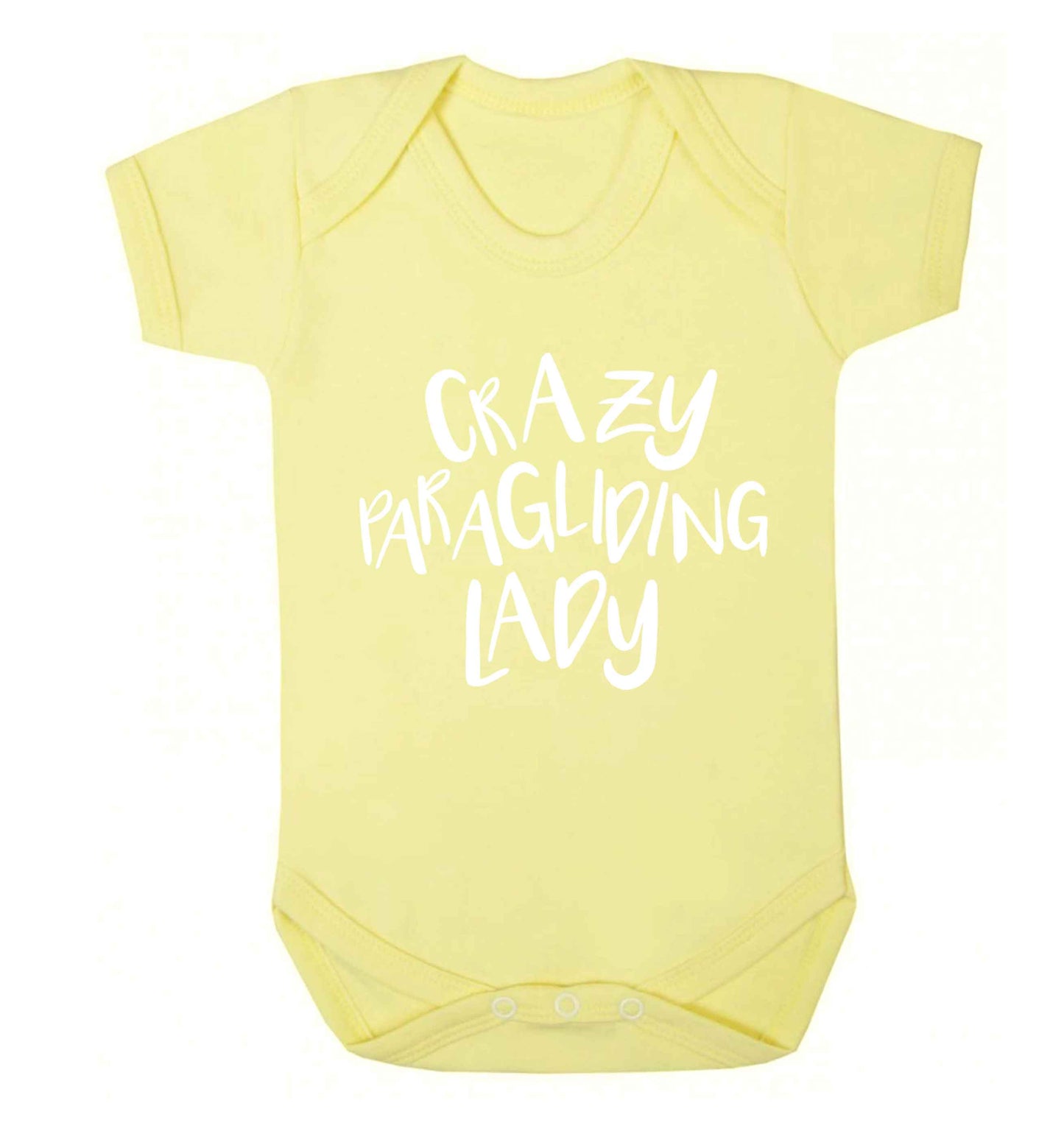 Crazy paragliding lady Baby Vest pale yellow 18-24 months
