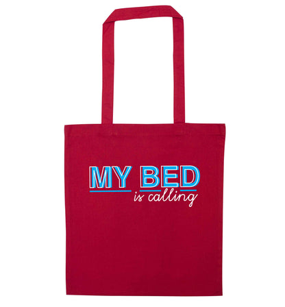 My bed is calling red tote bag