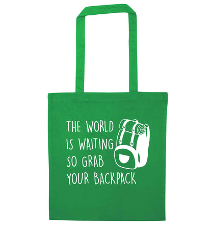 The world is waiting so grab your backpack green tote bag