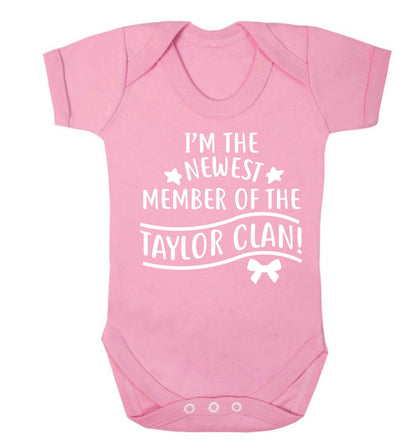 Personalised, newest member of the Taylor clan Baby Vest pale pink 18-24 months