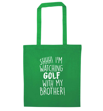 Shh I'm watching golf with my brother green tote bag