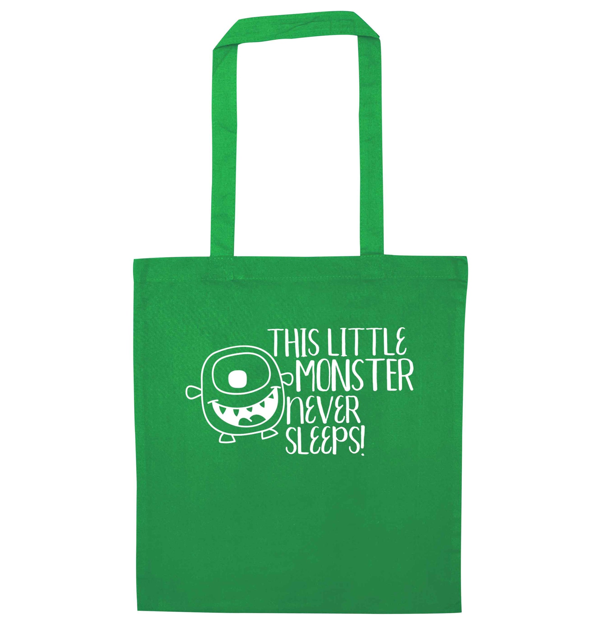 This little monster never sleeps green tote bag