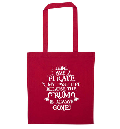 I think I was a pirate in my past life the rum is always gone red tote bag