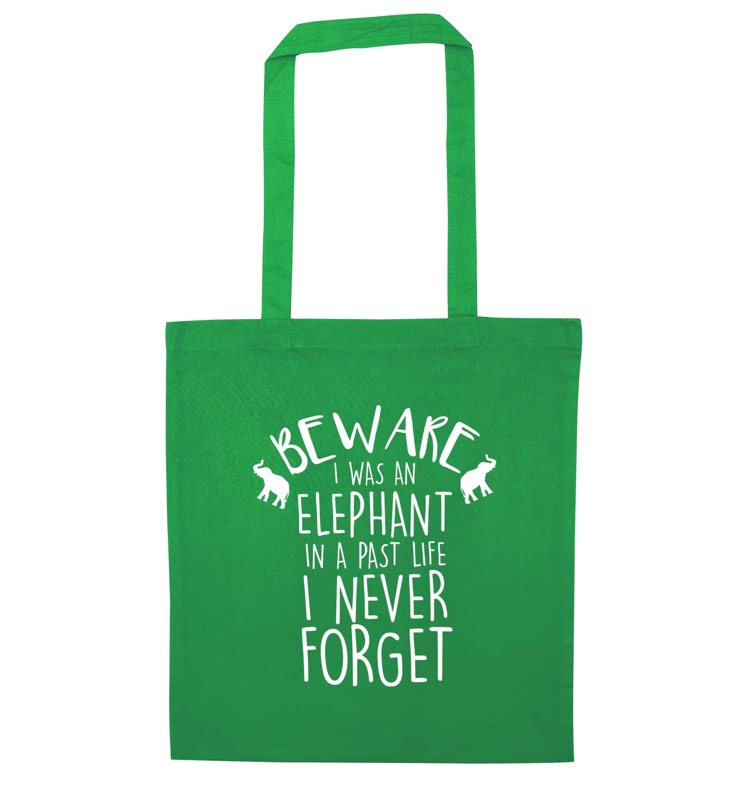 Beware I was an elephant in my past life I never forget green tote bag