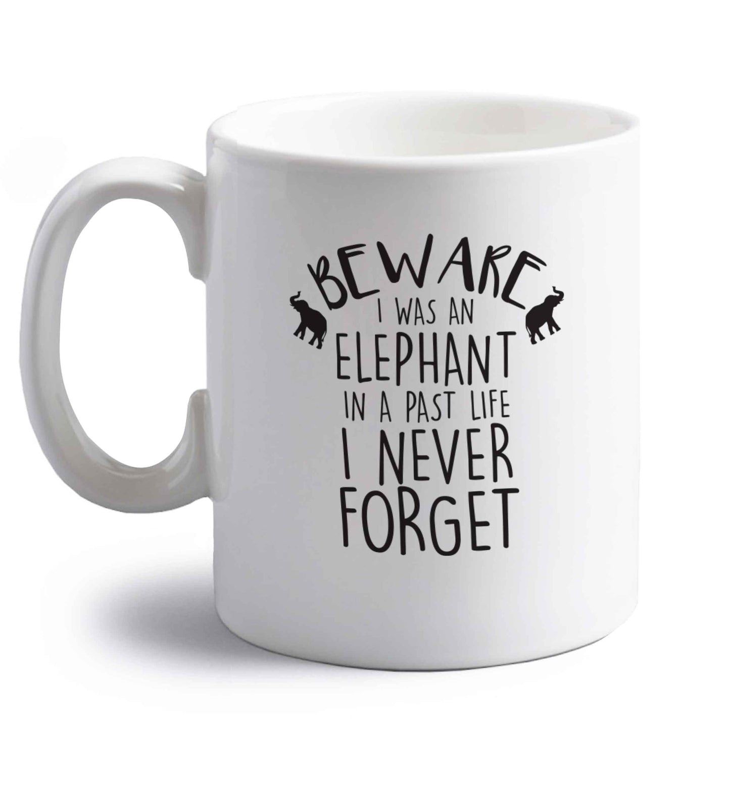 Beware I was an elephant in my past life I never forget right handed white ceramic mug 