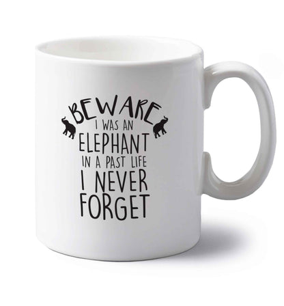 Beware I was an elephant in my past life I never forget left handed white ceramic mug 