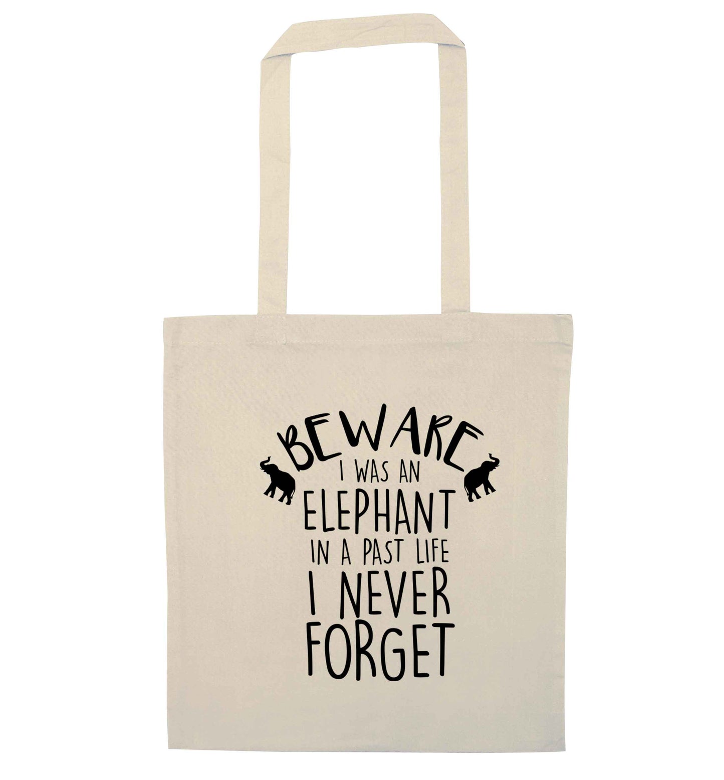 Beware I was an elephant in my past life I never forget natural tote bag