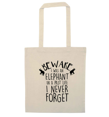 Beware I was an elephant in my past life I never forget natural tote bag