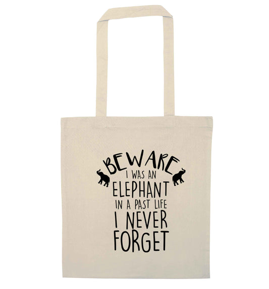 Beware I was an elephant in my past life I never forget natural tote bag