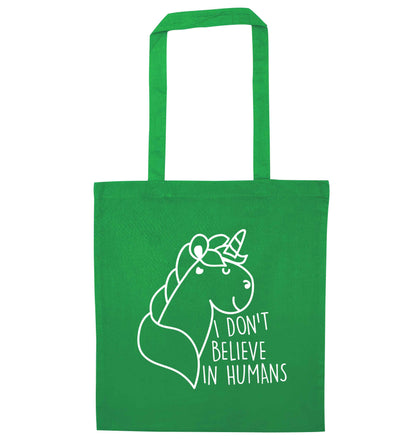 I don't believe in humans green tote bag