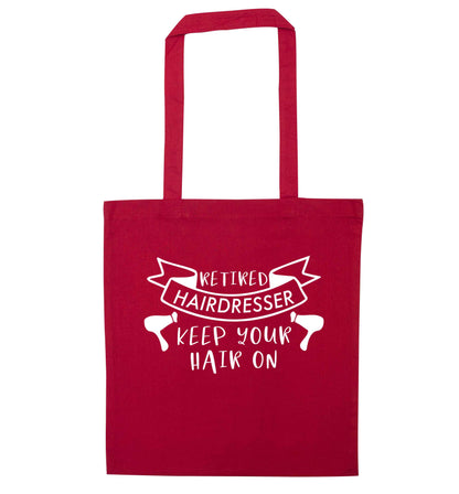Retired hairdresser keep your hair on red tote bag