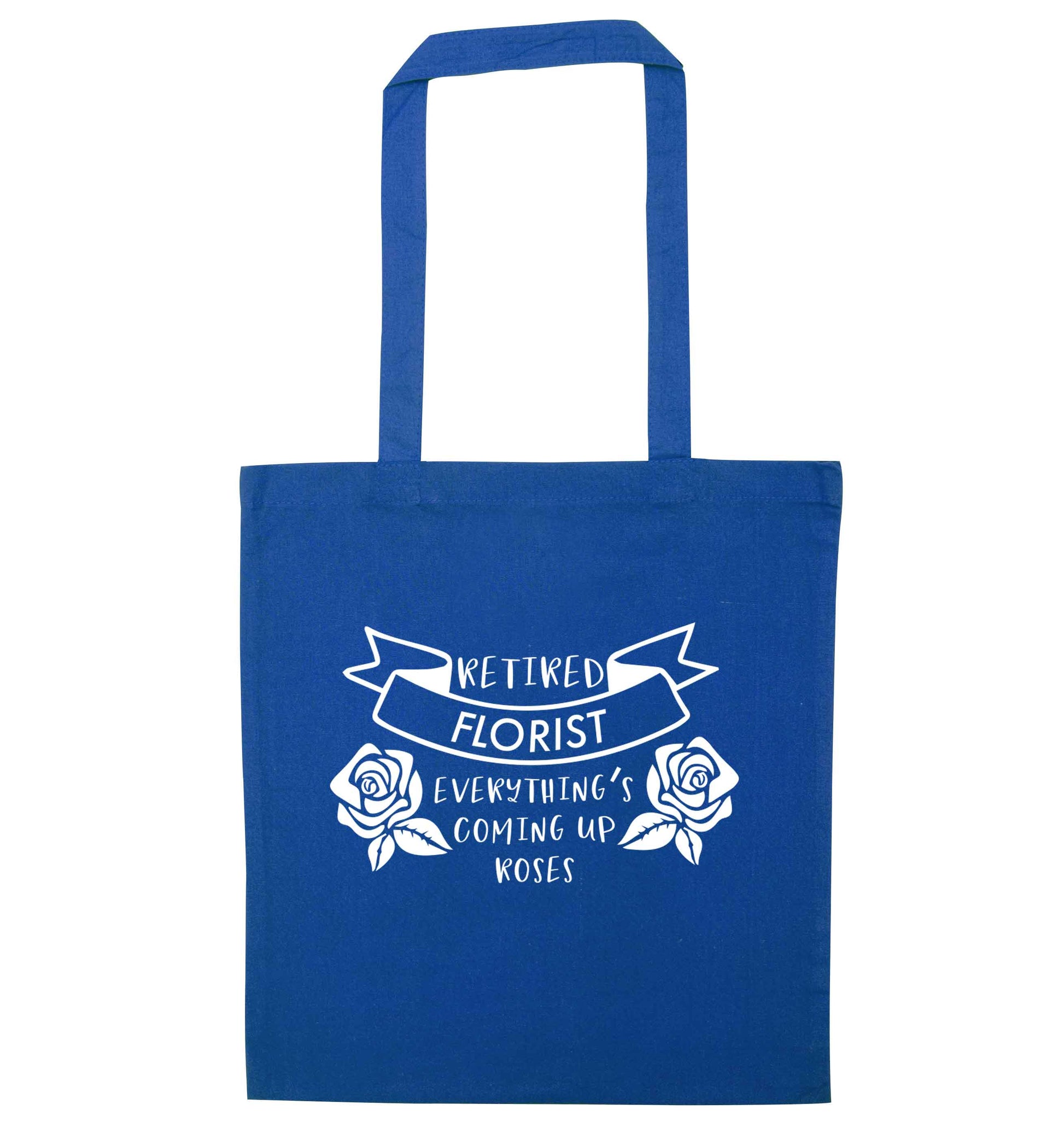 Retired florist everything's coming up roses blue tote bag