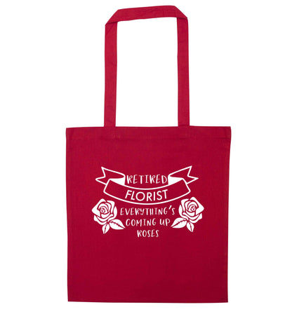 Retired florist everything's coming up roses red tote bag