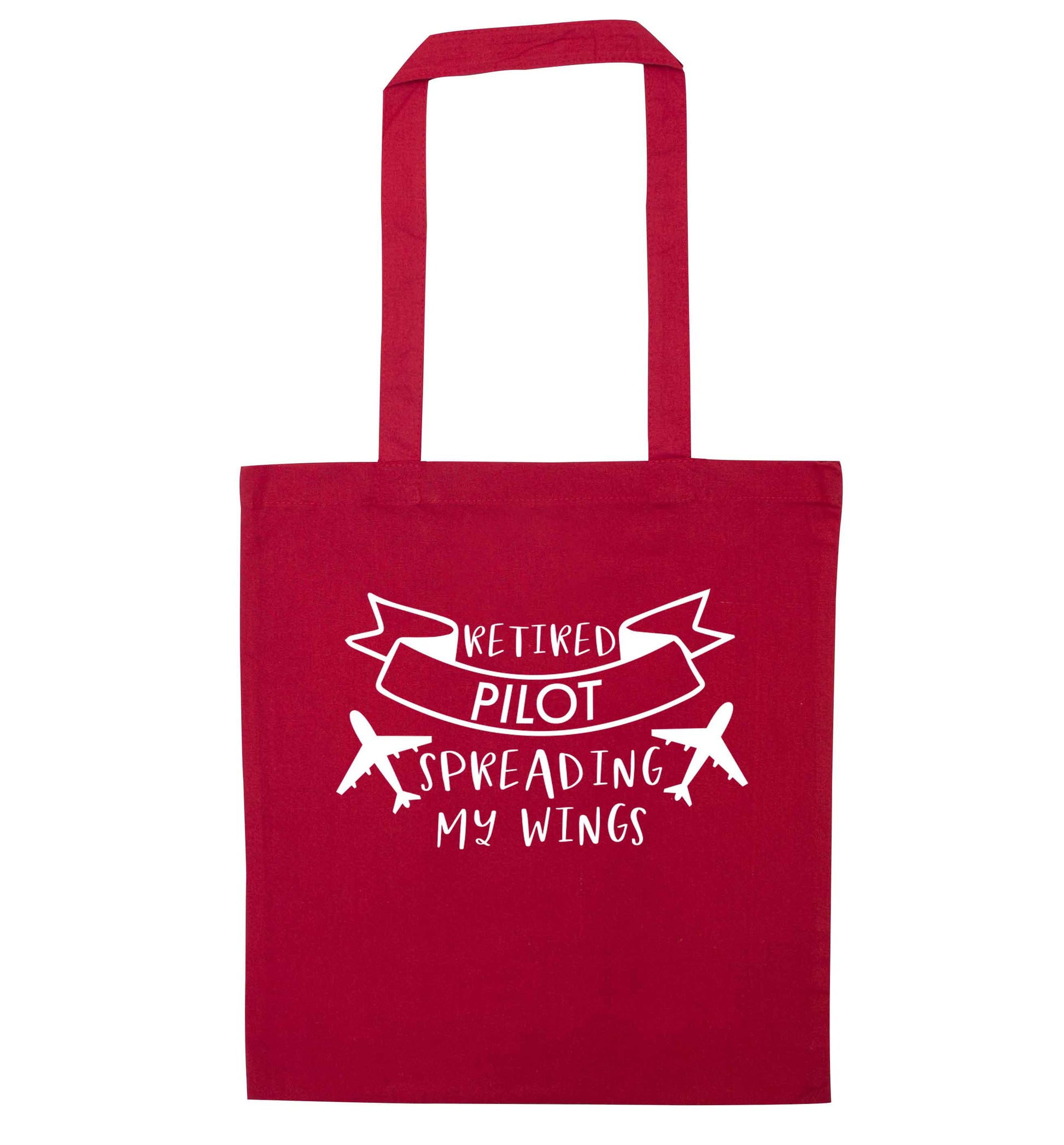Retired pilot spreading my wings red tote bag