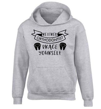Retired orthodontist brace yourself children's grey hoodie 12-13 Years