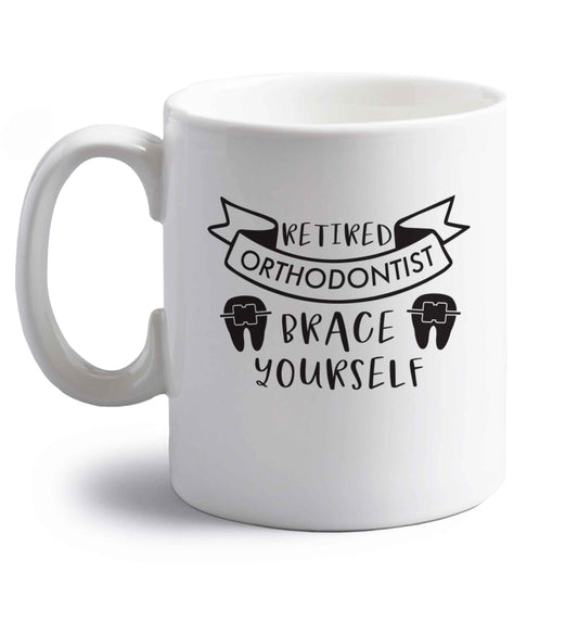 Retired orthodontist brace yourself right handed white ceramic mug 