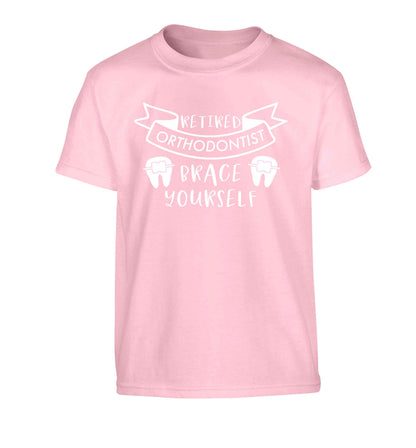 Retired orthodontist brace yourself Children's light pink Tshirt 12-13 Years