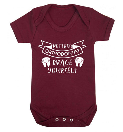Retired orthodontist brace yourself Baby Vest maroon 18-24 months