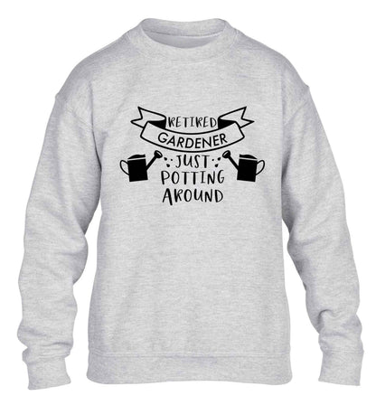 Retired gardener just potting around children's grey sweater 12-13 Years