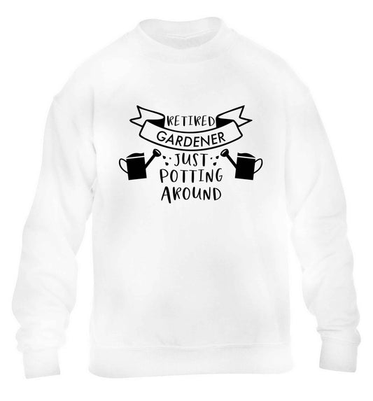 Retired gardener just potting around children's white sweater 12-13 Years