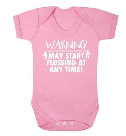 Warning may start flossing Baby Vest pale pink 18-24 months