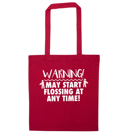Warning may start flossing red tote bag